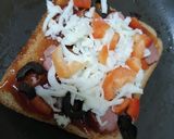 A picture of step 2 of Bread pizza.