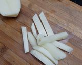 A picture of step 1 of Masala french fries.