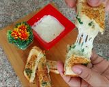 A picture of step 1 of Domino's style cheesy Garlic Bread.