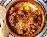 Foto del paso 6 de la receta: Huevos a la Flamenca con Migas y Chistorra