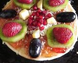 A picture of step 4 of Mix fruit pizza.
