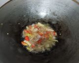 Foto langkah ke 3 dari resep Oseng bunga pepaya tahu teri.