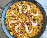 Foto del paso 9 de la receta: Arroz con rodaja de pota, langostinos y calabacín