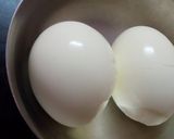 A picture of step 1 of Cheesy Egg sandwich.