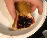 A picture of step 4 of PB&J but only one slice of bread.