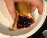 A picture of step 4 of PB&J but only one slice of bread.