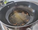 A picture of step 2 of Stuffed Brinjal potatoes in gravy.