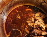 A picture of step 7 of SPICY Pulled Pork 😋 in Dutch oven.