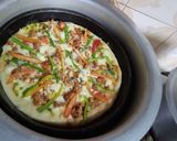 A picture of step 3 of Pizza in pateeli.