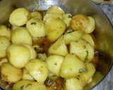 A picture of step 14 of Dum Aloo.