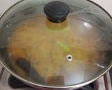 A picture of step 8 of Burmese samosa curry with saffron rice.