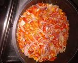 A picture of step 4 of Moi-moi with onion sauce.