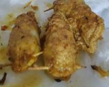 A picture of step 4 of Chicken stuffed squid.