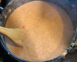 A picture of step 8 of Ovo Con Tomato.