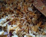 A picture of step 6 of Patacones or Tostones with minced chicken topping.