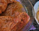 Foto del paso 3 de la receta: Conejo al horno adobado