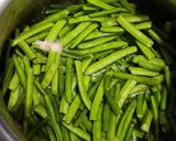 A picture of step 1 of Cluster beans sabji in curd.