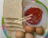 A picture of step 1 of Bread in egg sandwich.