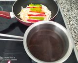 Foto del paso 2 de la receta: Paella con bonito, pimientos y ajos tiernos