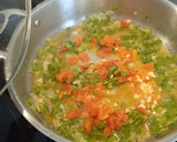 Foto del paso 5 de la receta: Calamares rellenos de arroz y langostinos