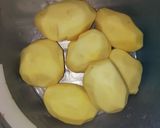 A picture of step 1 of Baked potato wedges.