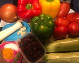 Foto del paso 1 de la receta Fritada de pimientos y calabacín con pasas en Thermomix