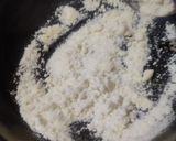 A picture of step 2 of Khajoor coconut peda.