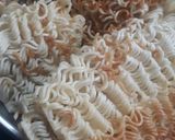 A picture of step 1 of Fried maggi.