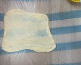 A picture of step 4 of Parotta(maida paratha).