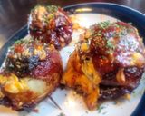 A picture of step 7 of BBQ Bacon-Wrapped Burger-Stuffed Onion Bombs.