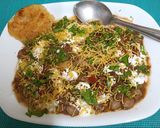 A picture of step 7 of Kashi Chat Bhandar's Chole Tikki Chat.
