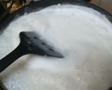 A picture of step 1 of Milk and raw coconut ladoo.
