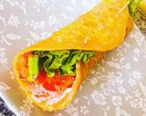 Une image de l'étape 3 de Wrap de patate douce à l’avocat, tomate et oignon rouge.
