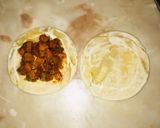 A picture of step 25 of Fateera with hotdog filling.