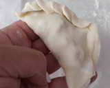 Foto del paso 5 de la receta: Empanadillas de bacalao y pasas