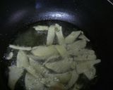 Foto del paso 2 de la receta: Papas fritas en láminas saborizadas otra variante