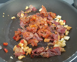 Foto del paso 3 de la receta: Espaguetis picantes con jamón ibérico y tomates secos