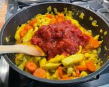 Une image de l'étape 15 de Poulet aux carottes, épices et lait de coco.