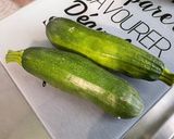 Une image de l'étape 3 de Courgettes et poivrons au lard et épices.