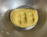 A picture of step 1 of Khaati Meethi Aam Ki Poori.