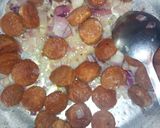 A picture of step 1 of Fried sausages in noodles.