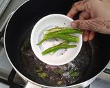 A picture of step 2 of Simple Peas Rice.