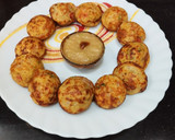 A picture of step 5 of Moong Dal Appe with vegetables.
