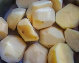 A picture of step 2 of Aloo anda salan.