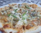 A picture of step 4 of Chicken tikka pizza.