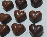 Foto del paso 4 de la receta: Bombones de chocolate simples, rellenos y chupetines fáciles
