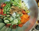 A picture of step 3 of Spicy cabbage, carrot and cucumber pickle.