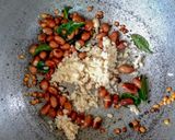 A picture of step 3 of Coconut rice.