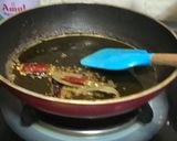 A picture of step 2 of Muri Ghonto: Bengali Yellow Rice with Fish Head.