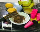 A picture of step 1 of Banana Mango Popsicles.